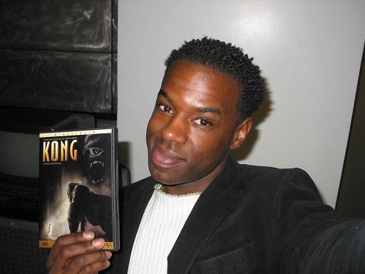 King Kong Fan with his DVD - 512x384, 29kB