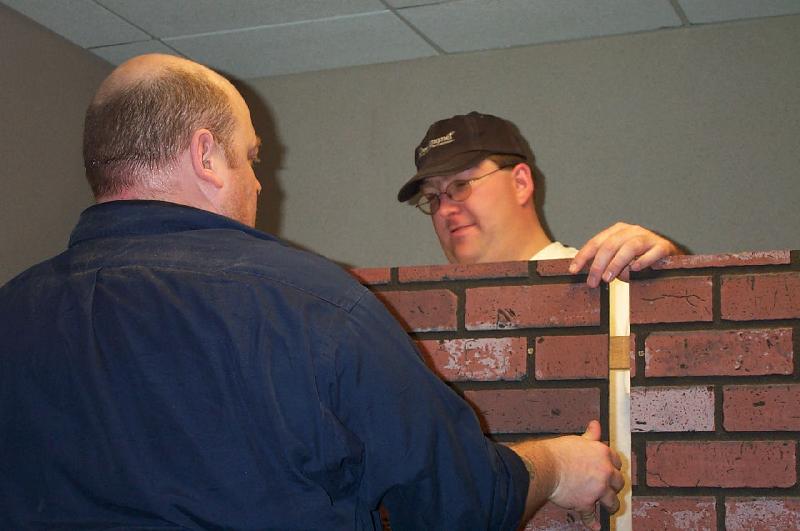 Building the Fireplace for Dragon*Con 2002 - 800x531, 51kB
