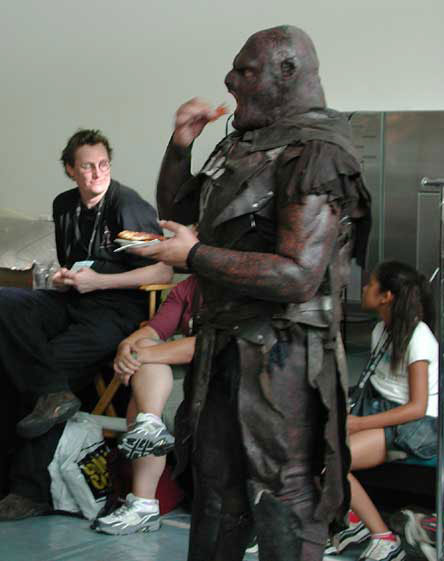 Behind the Scenes at Comic-Con - Uruk Eating - 444x561, 33kB