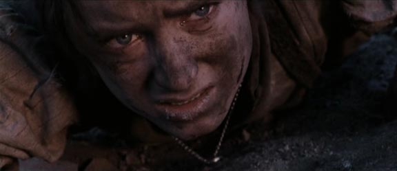 A Desperate Frodo Inches Up Mt Doom - 576x249, 37kB