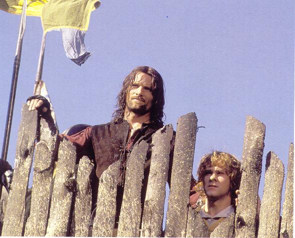 Aragorn and Merry on the Battlements - 588x475, 63kB