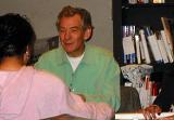 Ian McKellen smiling converses with fan. - (504x352, 33kB)